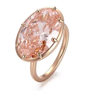 Claw set pink oval ring